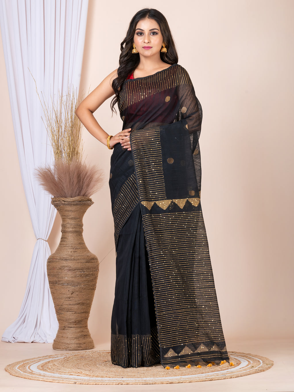 Cotton tissue jamdani saree.