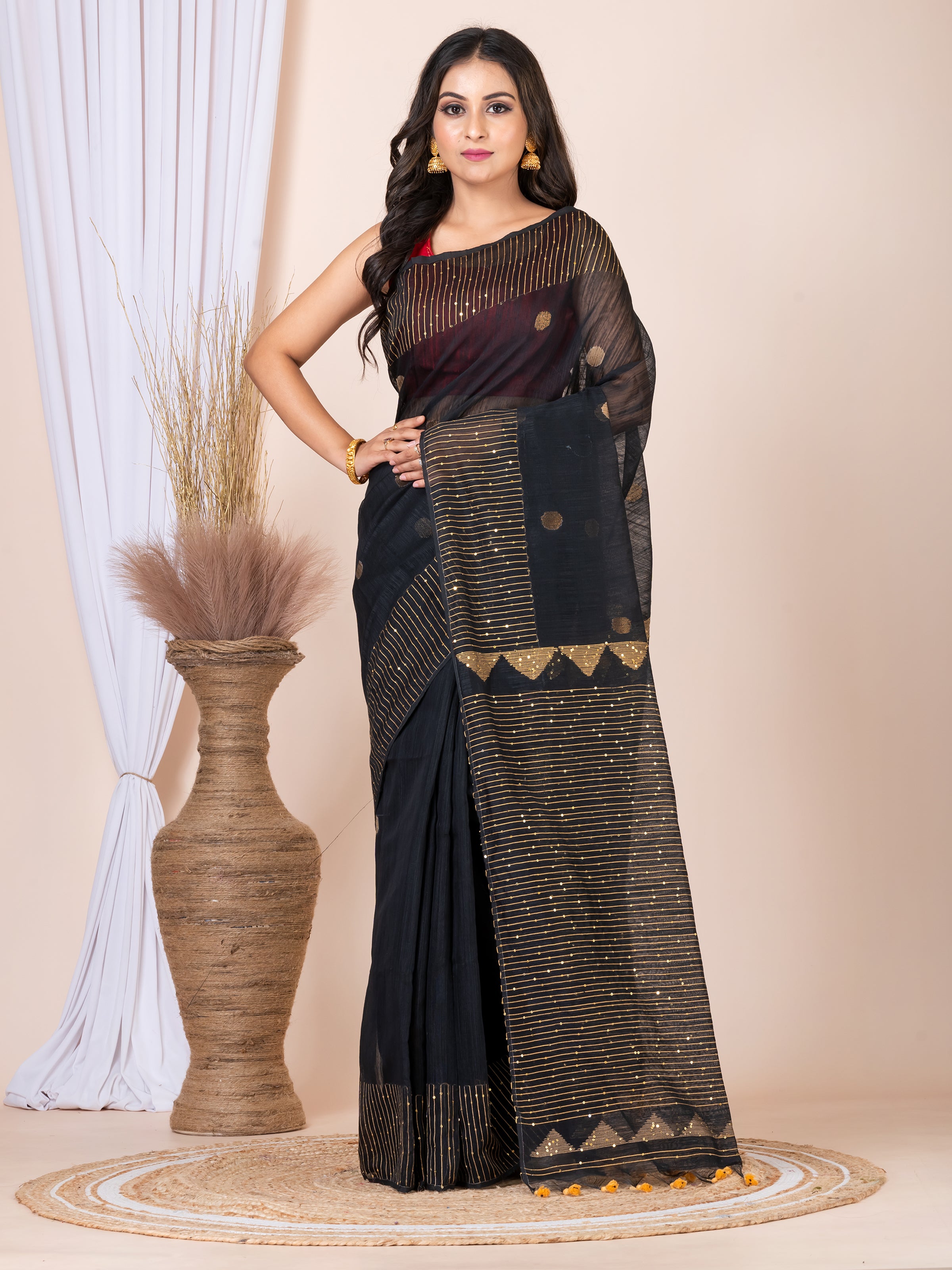 Cotton tissue jamdani saree.