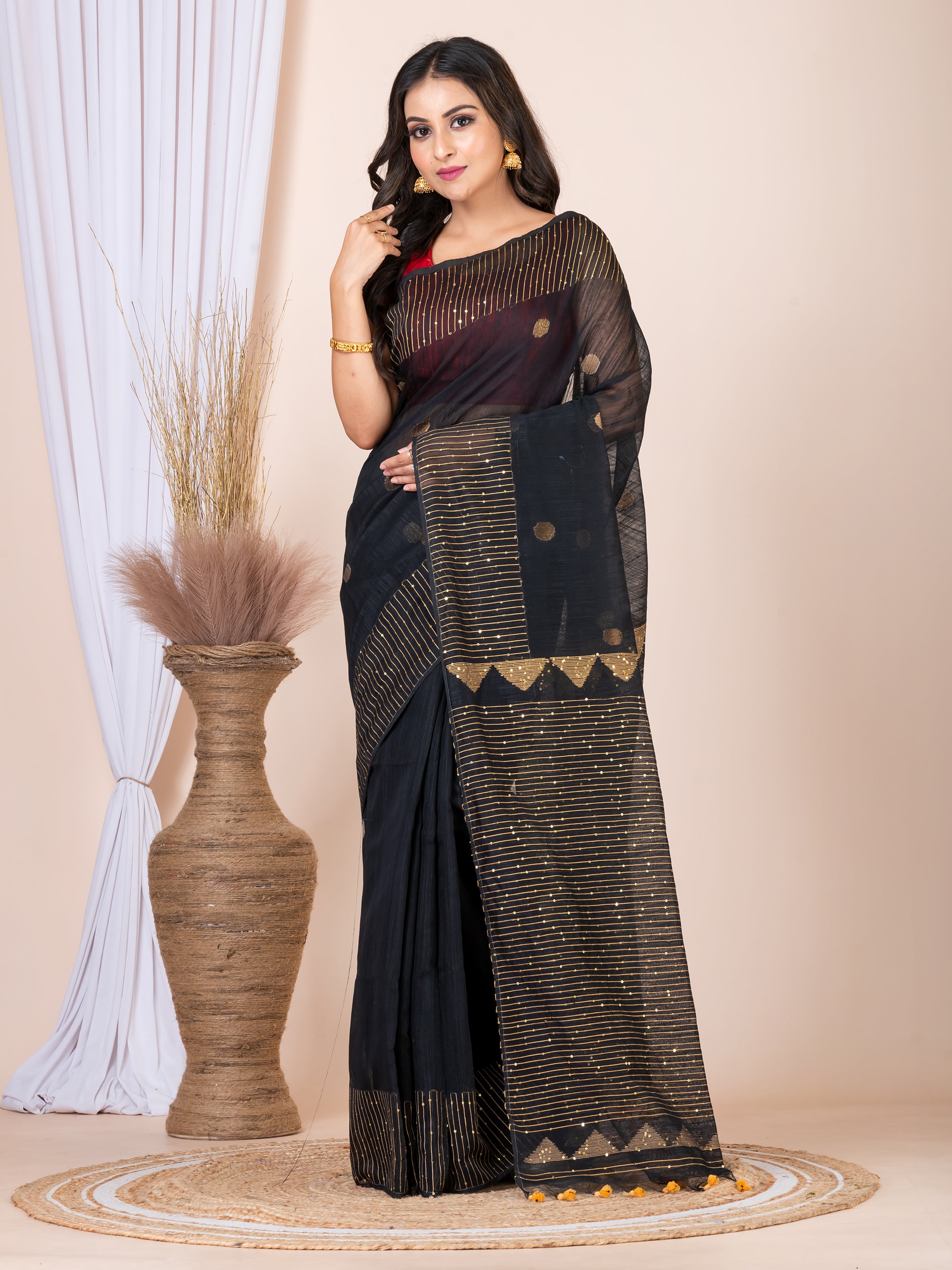 Cotton tissue jamdani saree.