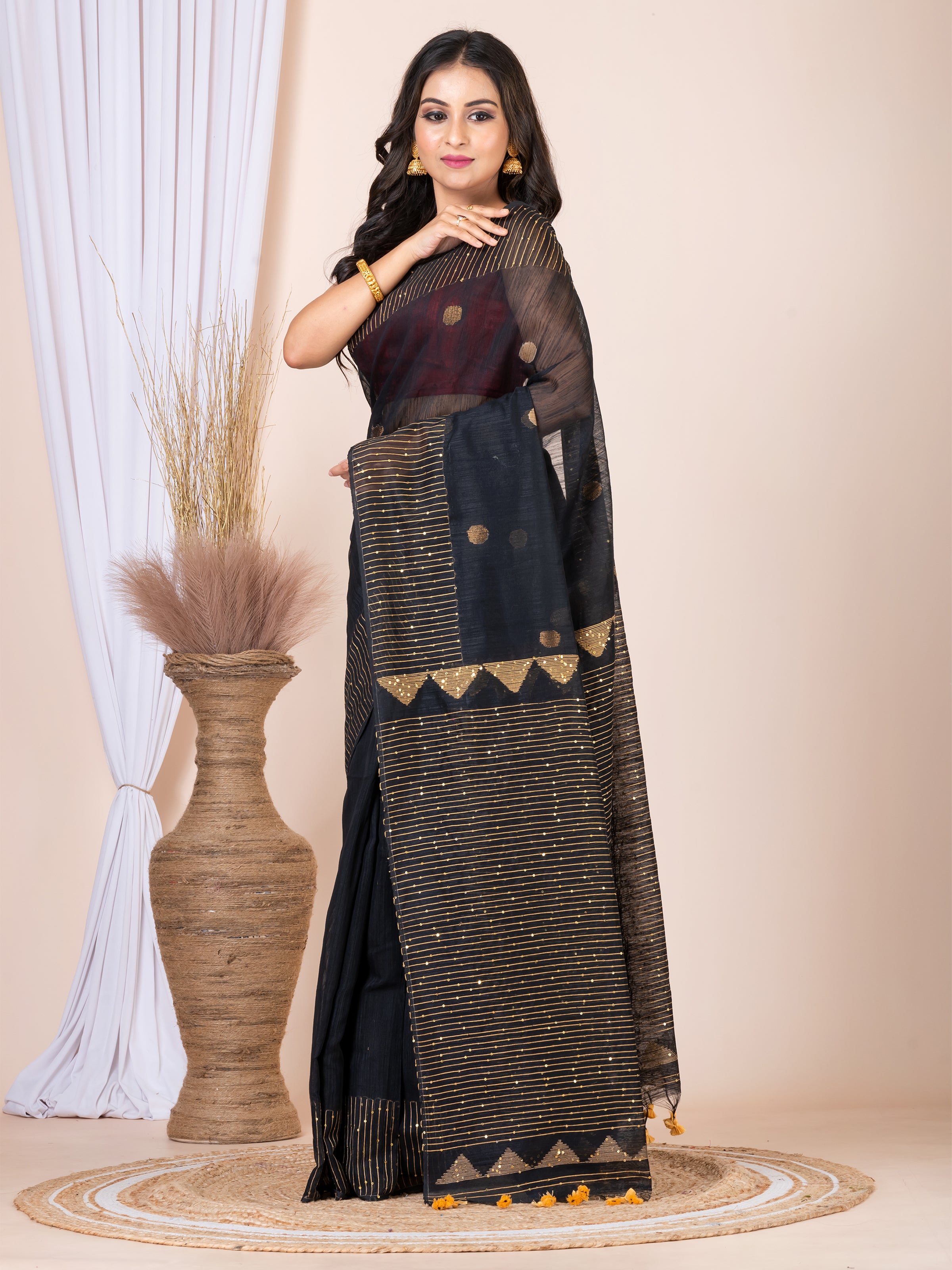 Cotton tissue jamdani saree.