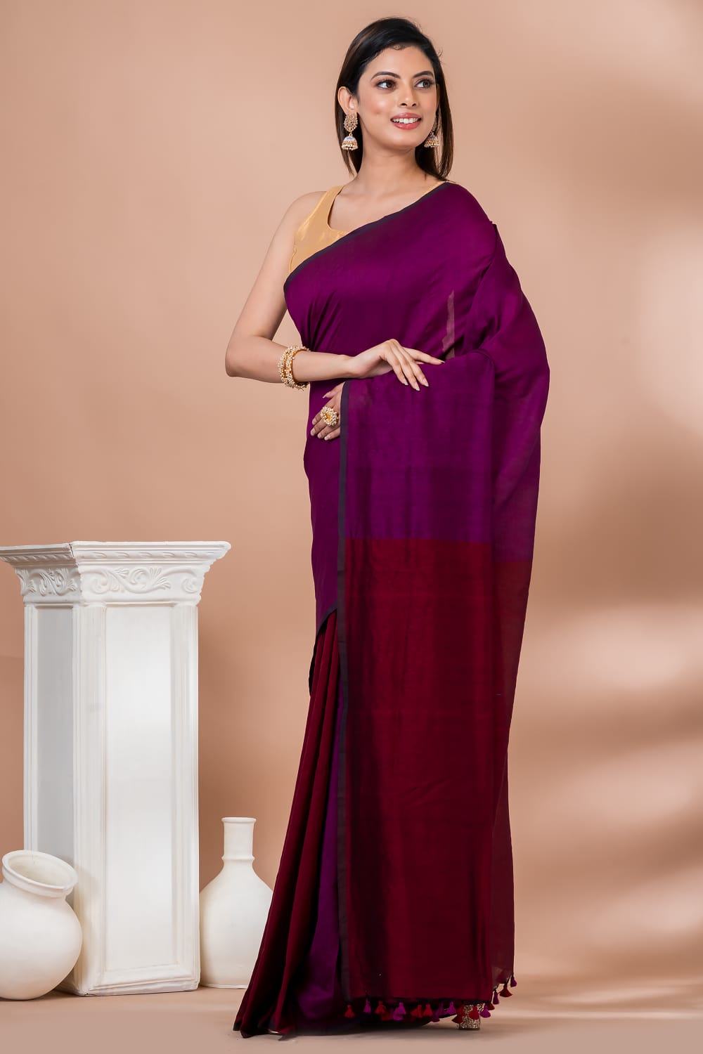 Soft cotton colorblock saree in raani pink and maroon red combination with blouse piece attached.