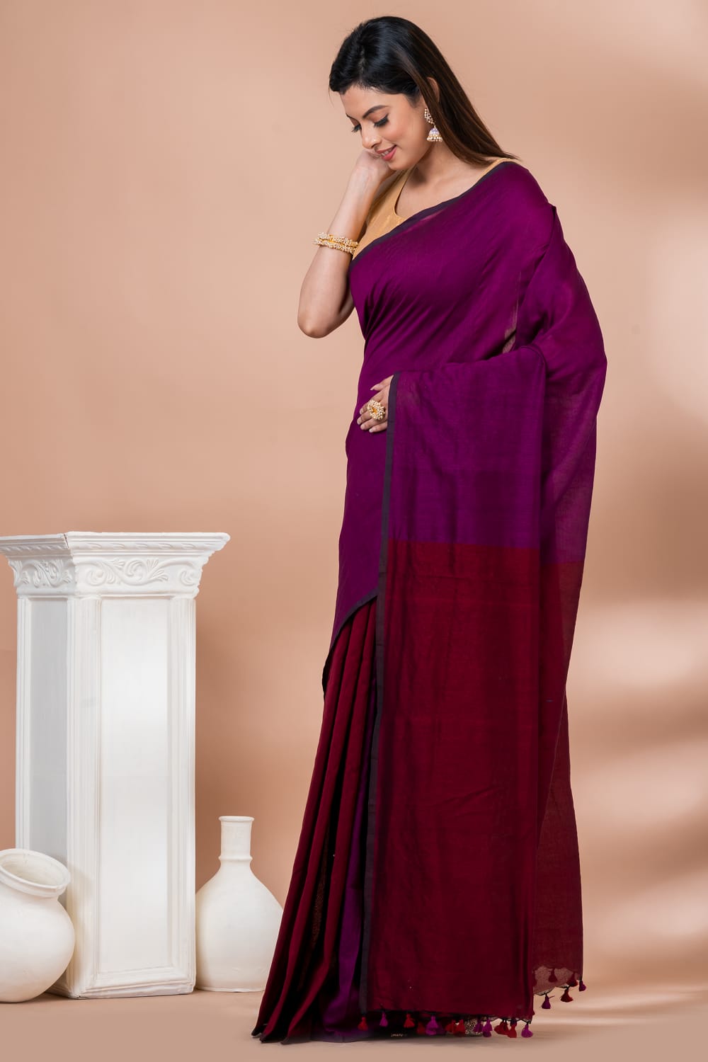 Soft cotton colorblock saree in raani pink and maroon red combination with blouse piece attached.